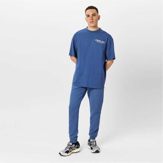 Мъжки меки спортни долнища Мъжко Спортно Долнище Everlast Elite Tech Joggers Mens Индиго Мъжко Спортно Долнище Everlast Elite Tech Joggers Mens Индиго Мъжки меки спортни долнища