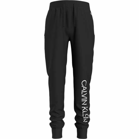 Детски долнища на анцуг Calvin Klein Спортно Долнище Момчета Institutional Jogging Pants Junior Boys Черно BAE Calvin Klein Спортно Долнище Момчета Institutional Jogging Pants Junior Boys Черно BAE Детски долнища на анцуг