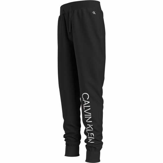 Детски долнища на анцуг Calvin Klein Спортно Долнище Момчета Institutional Jogging Pants Junior Boys Черно BAE Calvin Klein Спортно Долнище Момчета Institutional Jogging Pants Junior Boys Черно BAE Детски долнища на анцуг