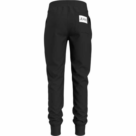 Детски долнища на анцуг Calvin Klein Спортно Долнище Момчета Institutional Jogging Pants Junior Boys Черно BAE Calvin Klein Спортно Долнище Момчета Institutional Jogging Pants Junior Boys Черно BAE Детски долнища на анцуг