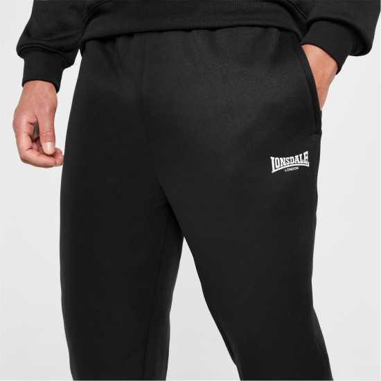 Мъжки меки спортни долнища Lonsdale Мъжко Спортно Долнище Essential Joggers Mens Черно Lonsdale Мъжко Спортно Долнище Essential Joggers Mens Черно Мъжки меки спортни долнища