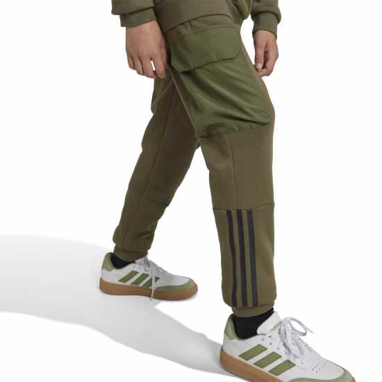 Детски долнища на анцуг Adidas Utility Joggers Juniors Хаки Adidas Utility Joggers Juniors Хаки Детски долнища на анцуг