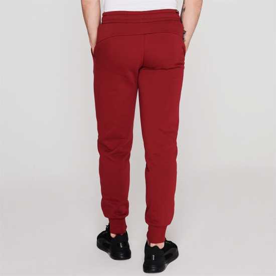 Мъжки меки спортни долнища Puma Мъжко Долнище За Джогинг No 1 Logo Jogging Pants Mens Rhubarb Puma Мъжко Долнище За Джогинг No 1 Logo Jogging Pants Mens Rhubarb Мъжки меки спортни долнища