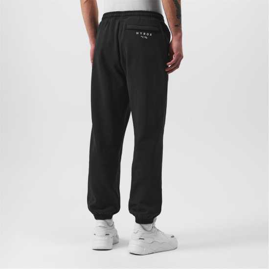 Мъжки меки спортни долнища Puma X Hyrox World Joggers Adults Черно Пума Puma X Hyrox World Joggers Adults Черно Пума Мъжки меки спортни долнища