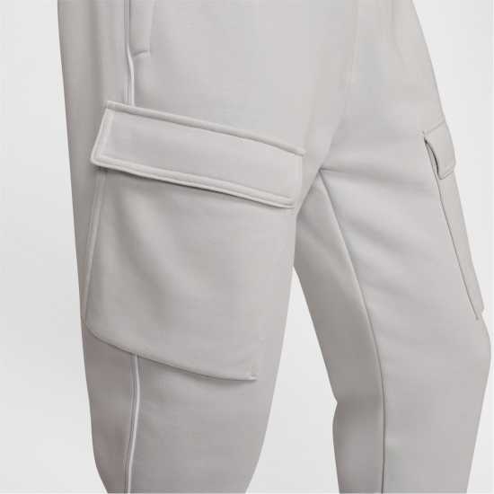 Мъжки меки спортни долнища Nike Nsw Sw Air Cargo Pant Flc Bb Сиво/Бяло Nike Nsw Sw Air Cargo Pant Flc Bb Сиво/Бяло Мъжки меки спортни долнища