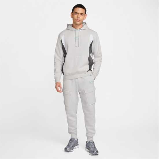 Мъжки меки спортни долнища Nike Nsw Sw Air Cargo Pant Flc Bb Сиво/Бяло Nike Nsw Sw Air Cargo Pant Flc Bb Сиво/Бяло Мъжки меки спортни долнища