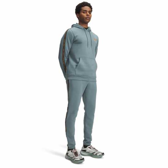 Under Armour Мъжко Спортно Долнище Icon Fleece Taping Joggers Mens Jasper Blue Мъжки меки спортни долнища