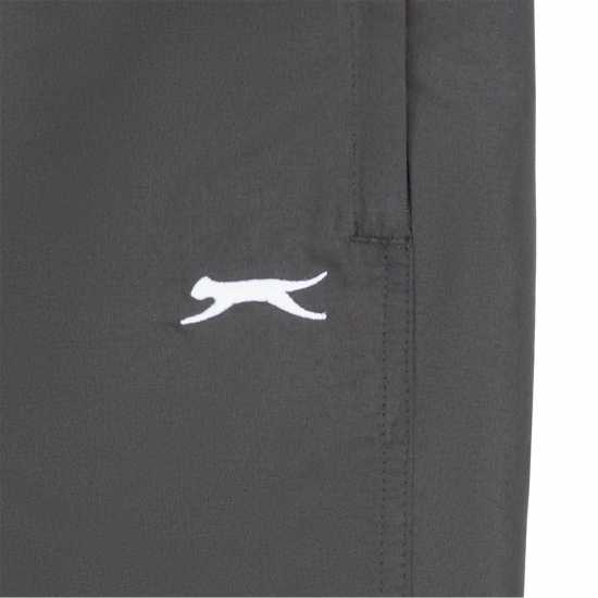 Детски долнища за бягане Slazenger Текстилно Долнище Детско Closed Hem Woven Pants Juniors Угъл Slazenger Текстилно Долнище Детско Closed Hem Woven Pants Juniors Угъл Детски долнища за бягане