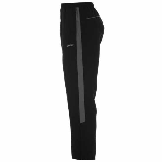 Детски долнища за бягане Slazenger Junior Boys Active Woven Track Pants Черно Slazenger Junior Boys Active Woven Track Pants Черно Детски долнища за бягане