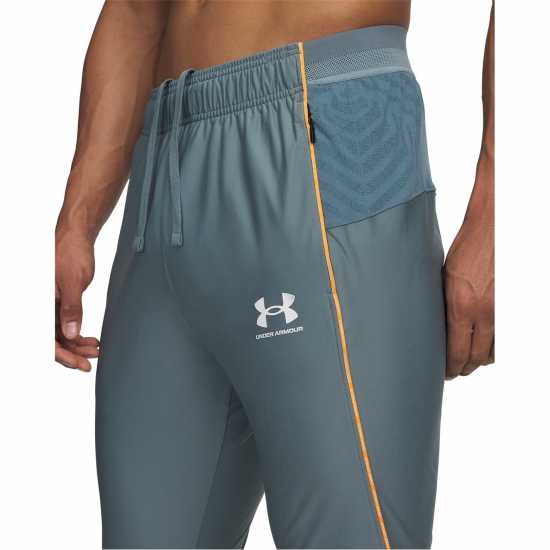 Мъжки спортни екипи в две части Under Armour Chal Pro Pant Sn61 Grey/Orange Under Armour Chal Pro Pant Sn61 Grey/Orange Мъжки спортни екипи в две части