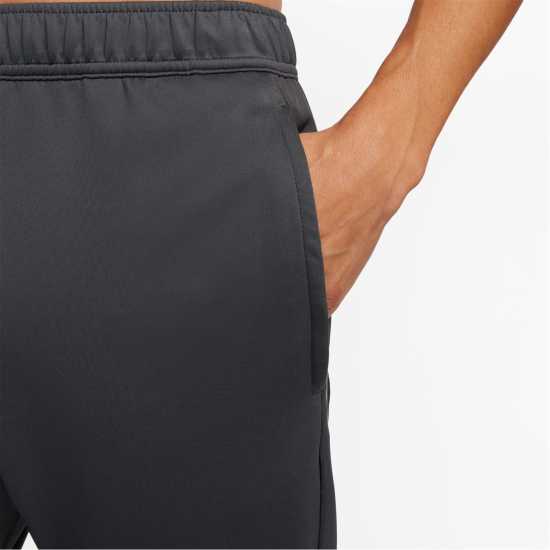 Nike Dri-FIT ADV Axis Men's Utility Fitness Pants  Мъжки долнища за бягане