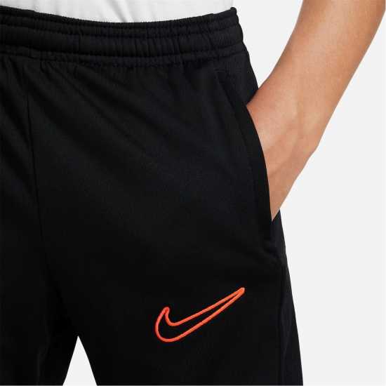 Детски долнища за бягане Nike Academy Training Pants Juniors Black/White/Pink Nike Academy Training Pants Juniors Black/White/Pink Детски долнища за бягане