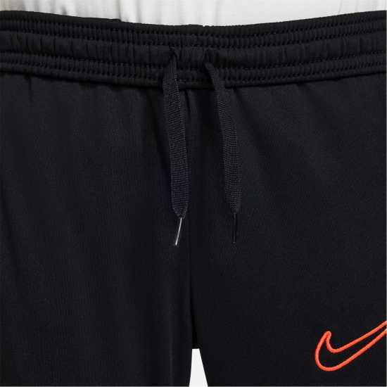 Детски долнища за бягане Nike Academy Training Pants Juniors Black/White/Pink Nike Academy Training Pants Juniors Black/White/Pink Детски долнища за бягане