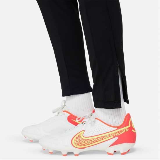 Детски долнища за бягане Nike Academy Training Pants Juniors Black/White/Pink Nike Academy Training Pants Juniors Black/White/Pink Детски долнища за бягане