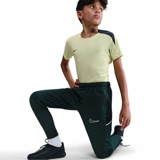 Детски долнища за бягане Nike Academy Training Pants Juniors Black/White/Pink Nike Academy Training Pants Juniors Black/White/Pink Детски долнища за бягане