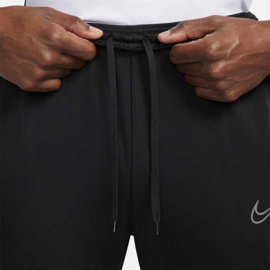 Мъжки спортни екипи в две части Nike Academy Winter Warrior Men's Therma-FIT Soccer Pants Черно/Сиво Nike Academy Winter Warrior Men's Therma-FIT Soccer Pants Черно/Сиво Мъжки спортни екипи в две части