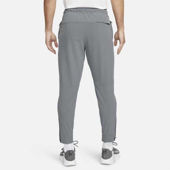 Nike Unlimited Men's Dri-FIT Zippered Cuff Versatile Pants Сиво/Черно 