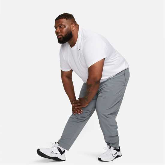 Nike Unlimited Men's Dri-FIT Zippered Cuff Versatile Pants Сиво/Черно 