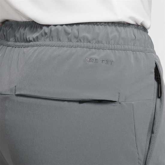 Nike Unlimited Men's Dri-FIT Zippered Cuff Versatile Pants Сиво/Черно 