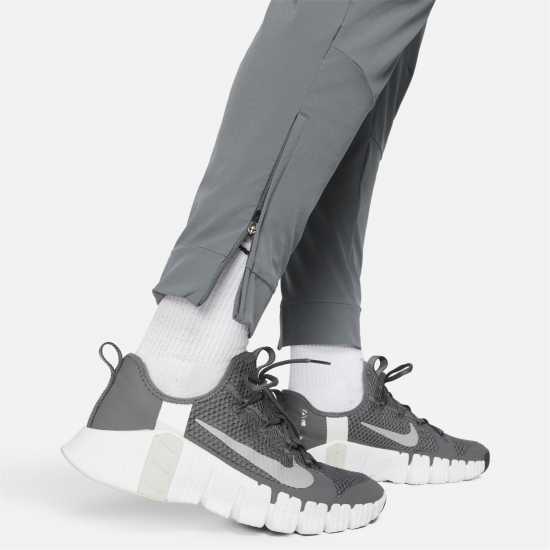 Nike Unlimited Men's Dri-FIT Zippered Cuff Versatile Pants Сиво/Черно 