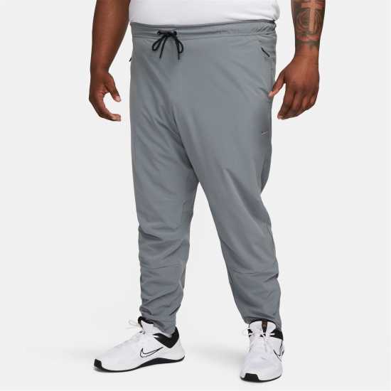 Nike Unlimited Men's Dri-FIT Zippered Cuff Versatile Pants Сиво/Черно 
