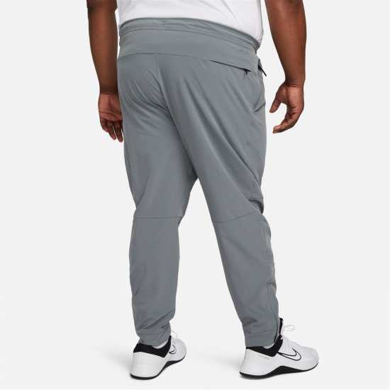 Nike Unlimited Men's Dri-FIT Zippered Cuff Versatile Pants Сиво/Черно 