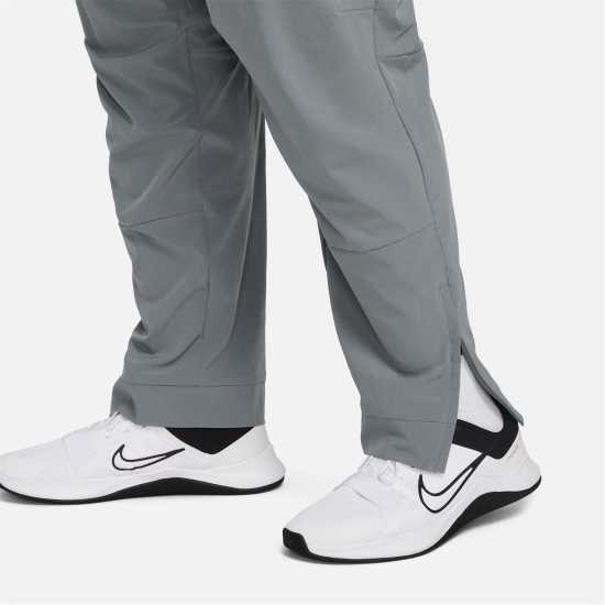 Nike Unlimited Men's Dri-FIT Zippered Cuff Versatile Pants Сиво/Черно 