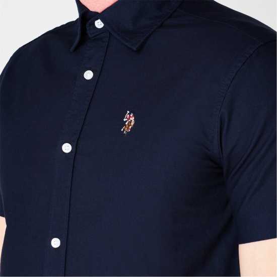 Мъжки ризи Us Polo Assn Мъжка Риза Къс Ръкав Us Polo Oxford Short Sleeve Shirt Mens Нави блейзър Us Polo Assn Мъжка Риза Къс Ръкав Us Polo Oxford Short Sleeve Shirt Mens Нави блейзър Мъжки ризи