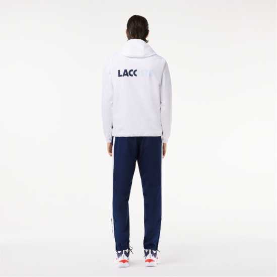 Мъжки спортни екипи в две части Lacoste Tennis Tracksuit Бяло/Морско синьо Lacoste Tennis Tracksuit Бяло/Морско синьо Мъжки спортни екипи в две части