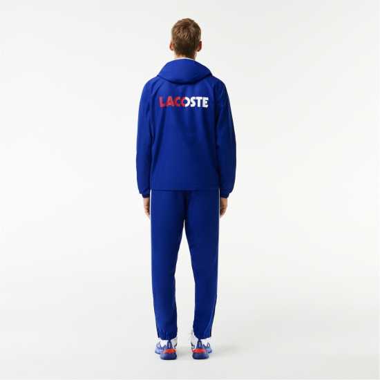 Lacoste Tennis Tracksuit Капитан/Оранжев Мъжки спортни екипи в две части