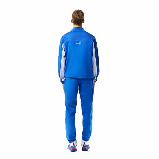 Мъжки спортни екипи в две части Lacoste Logo Stripe Tracksuit Морско синьо/бяло Lacoste Logo Stripe Tracksuit Морско синьо/бяло Мъжки спортни екипи в две части