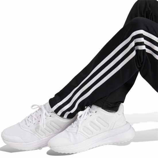 Детски спортни екипи Adidas Essentials Tiberio Tracksuit Полу люцидна Фуч Adidas Essentials Tiberio Tracksuit Полу люцидна Фуч Детски спортни екипи