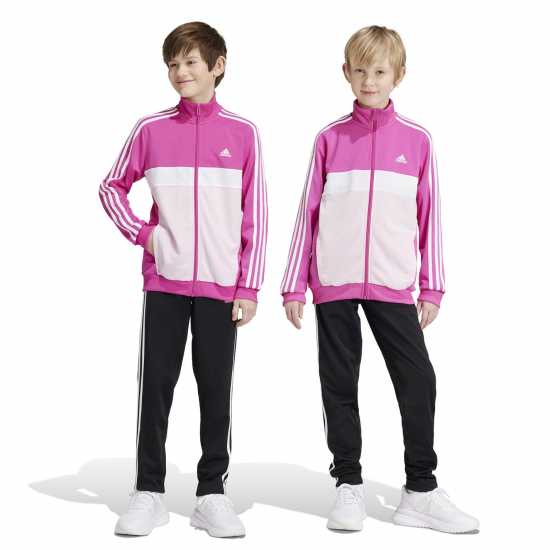 Детски спортни екипи Adidas Essentials Tiberio Tracksuit Полу люцидна Фуч Adidas Essentials Tiberio Tracksuit Полу люцидна Фуч Детски спортни екипи