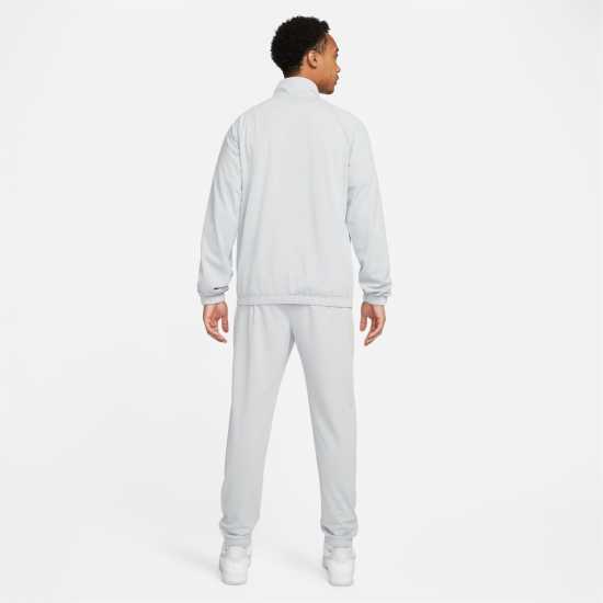 Мъжки спортни екипи в две части Nike Мъжки Спортен Екип Club Pk Tracksuit Mens Grey/White Nike Мъжки Спортен Екип Club Pk Tracksuit Mens Grey/White Мъжки спортни екипи в две части
