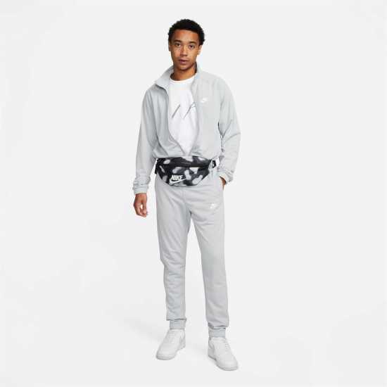 Мъжки спортни екипи в две части Nike Мъжки Спортен Екип Club Pk Tracksuit Mens Grey/White Nike Мъжки Спортен Екип Club Pk Tracksuit Mens Grey/White Мъжки спортни екипи в две части