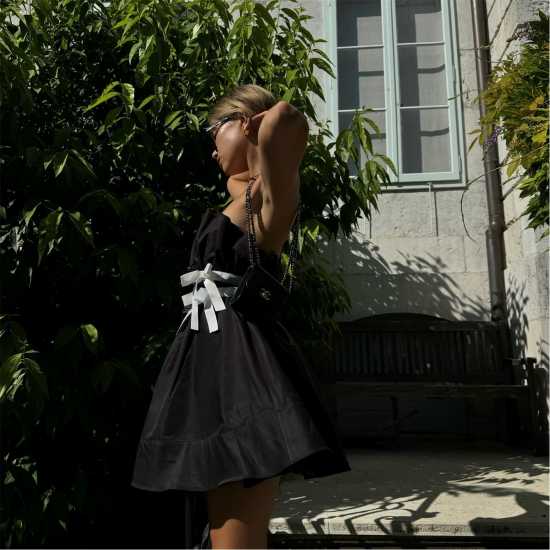 Дамски поли и рокли Collective The Label The Label Black Sleeveless Bow Mini-Dress Collective The Label The Label Black Sleeveless Bow Mini-Dress Дамски поли и рокли