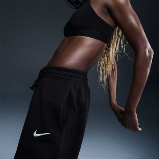 Дамски долнища на анцуг Nike Phoenix Fleece Joggers Womens Черно Nike Phoenix Fleece Joggers Womens Черно Дамски долнища на анцуг