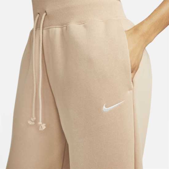 Дамски долнища на анцуг Nike Phoenix Fleece Joggers Womens Коноп/Платно Nike Phoenix Fleece Joggers Womens Коноп/Платно Дамски долнища на анцуг