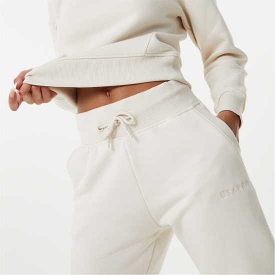 Дамски долнища на анцуг Usa Pro Classic Joggers Крем Usa Pro Classic Joggers Крем Дамски долнища на анцуг