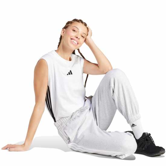 Дамски долнища на анцуг Adidas Essentials 3-Stripes Pants Slim Womens Средно сиво Adidas Essentials 3-Stripes Pants Slim Womens Средно сиво Дамски долнища на анцуг