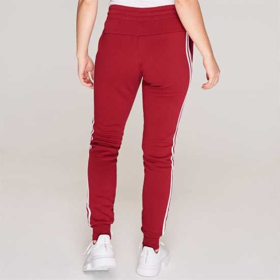 Дамски долнища на анцуг Adidas Essentials 3-Stripes Pants Slim Womens Maroon Adidas Essentials 3-Stripes Pants Slim Womens Maroon Дамски долнища на анцуг