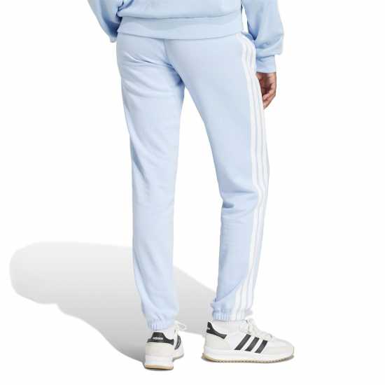 Дамски долнища на анцуг Adidas Essentials 3-Stripes Pants Slim Womens Свети синьо Adidas Essentials 3-Stripes Pants Slim Womens Свети синьо Дамски долнища на анцуг