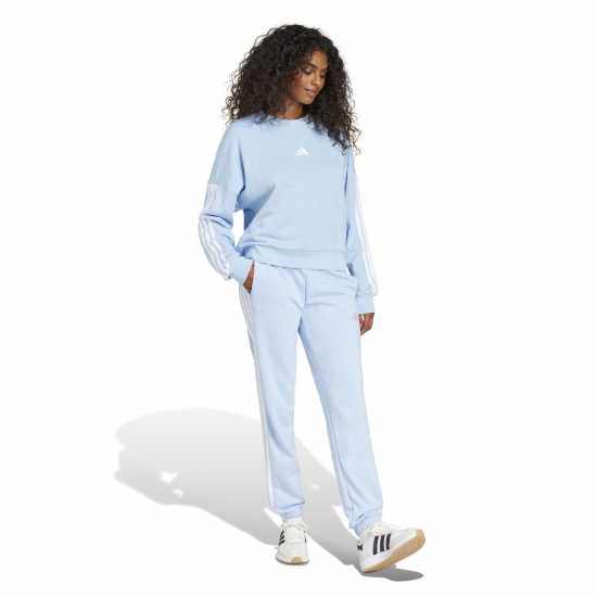 Дамски долнища на анцуг Adidas Essentials 3-Stripes Pants Slim Womens Свети синьо Adidas Essentials 3-Stripes Pants Slim Womens Свети синьо Дамски долнища на анцуг