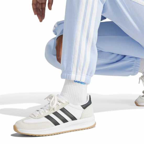 Дамски долнища на анцуг Adidas Essentials 3-Stripes Pants Slim Womens Свети синьо Adidas Essentials 3-Stripes Pants Slim Womens Свети синьо Дамски долнища на анцуг