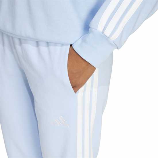 Дамски долнища на анцуг Adidas Essentials 3-Stripes Pants Slim Womens Свети синьо Adidas Essentials 3-Stripes Pants Slim Womens Свети синьо Дамски долнища на анцуг