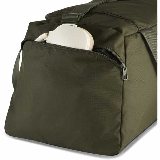 Дамски чанти Puma Fund M Sprt Bag 00 Dark Olive Puma Fund M Sprt Bag 00 Dark Olive Дамски чанти