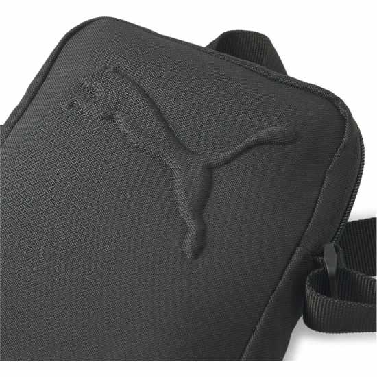 Дамски чанти Puma Buzz Portable Bag Puma Buzz Portable Bag Дамски чанти