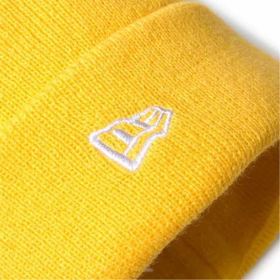 Шапки с козирка New Era Animal Pom Pom Beanie Juniors Средно жълто New Era Animal Pom Pom Beanie Juniors Средно жълто Шапки с козирка