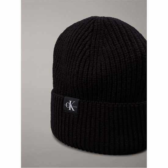 Шапки с козирка Calvin Klein Jeans Calvin Klein Jeans Monogram Rib Beanie Calvin Klein Jeans Calvin Klein Jeans Monogram Rib Beanie Шапки с козирка