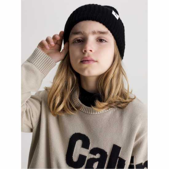 Шапки с козирка Calvin Klein Jeans Calvin Klein Jeans Monogram Rib Beanie Calvin Klein Jeans Calvin Klein Jeans Monogram Rib Beanie Шапки с козирка